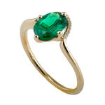 Floating Oval-Cut Emerald engagement ring1