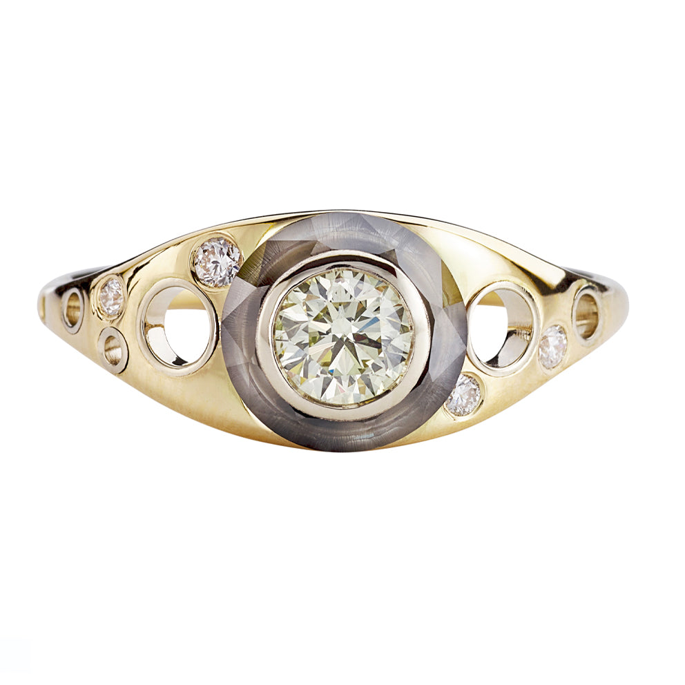 Golden-Grommet-Ring-with-a-Fancy-Green-Diamond-and-Grey-diamond-Sphere-closeup