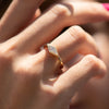 Lozenge-Cut-Diamond-Engagement-Ring-with-a-Golden-Bezel-side-shot