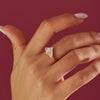 Moth-Diamond-Engagement-Ring-with-Modified-Trillion-and-Kite-on-finger