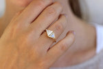 One Carat Trillion Cut Diamond Engagement Ring on hand