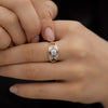 Piercing-Engagement-Ring-with-Grommets-and-a-Grey-Diamond-Halo-sparking