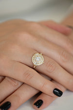 Round Diamond Cluster Ring with Asymmetric Frills Up Close on Hands 