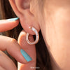 Spiral-Hoop-Earrings-with-Tapered-Baguette-Diamonds-rose-gold-18k