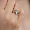 Starburst-Rose-Cut-Diamond-Engagement-Ring-with-Teal-Sapphire-Trillions-side-shot-in-set