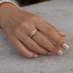 classic Emerald-cut engagement ring with tapered needle baguette diamonds3