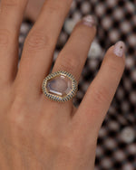 Aquarelle-Portrait-Cut-Montana-Sapphire-Halo-Ring-Midshot_f12e9d3e-cfc3-444f-9877-cf71a67e9050