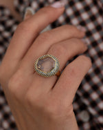 Aquarelle-Portrait-Cut-Montana-Sapphire-Halo-Ring-Side-Angle_e308a114-f007-4600-a0a7-fbb1e3f3b772