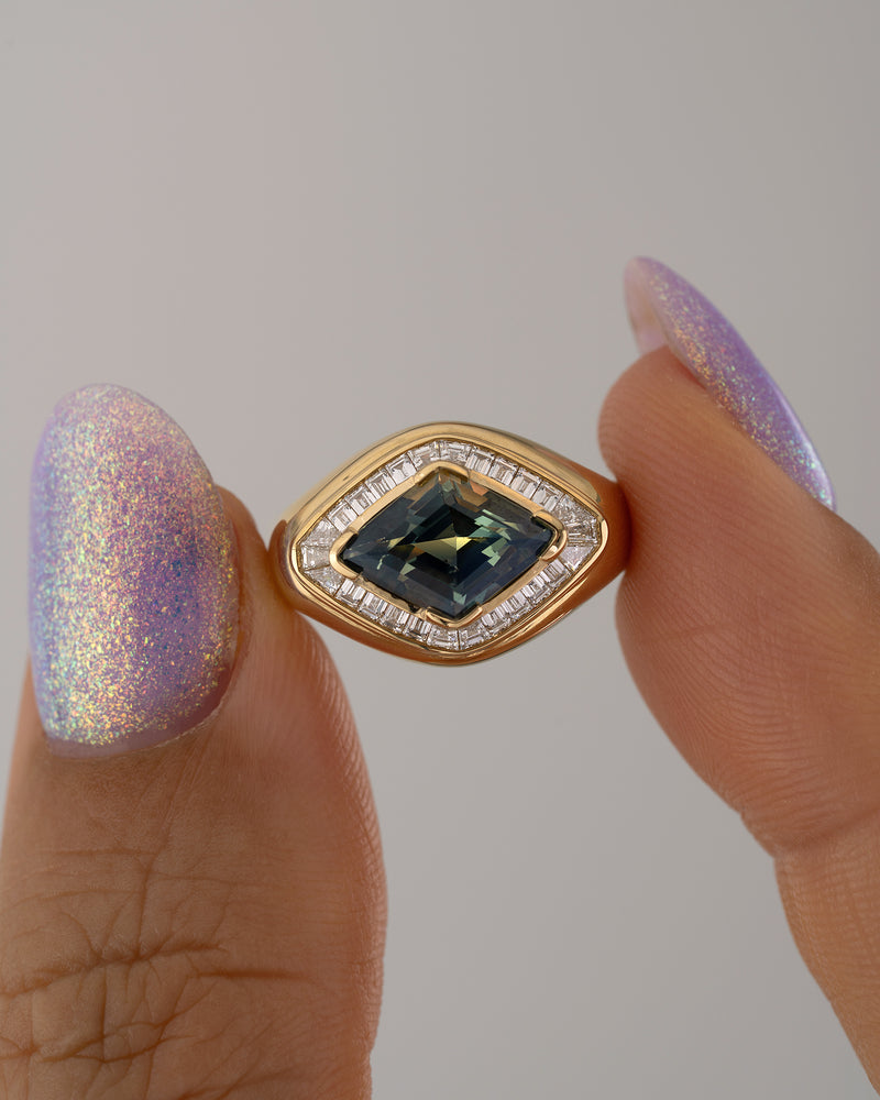 Aurora-Lozenge-Cut-Parti-Sapphire-_-Diamond-Ring-Holding_48976ee4-0114-47cc-a33f-bee273a94253