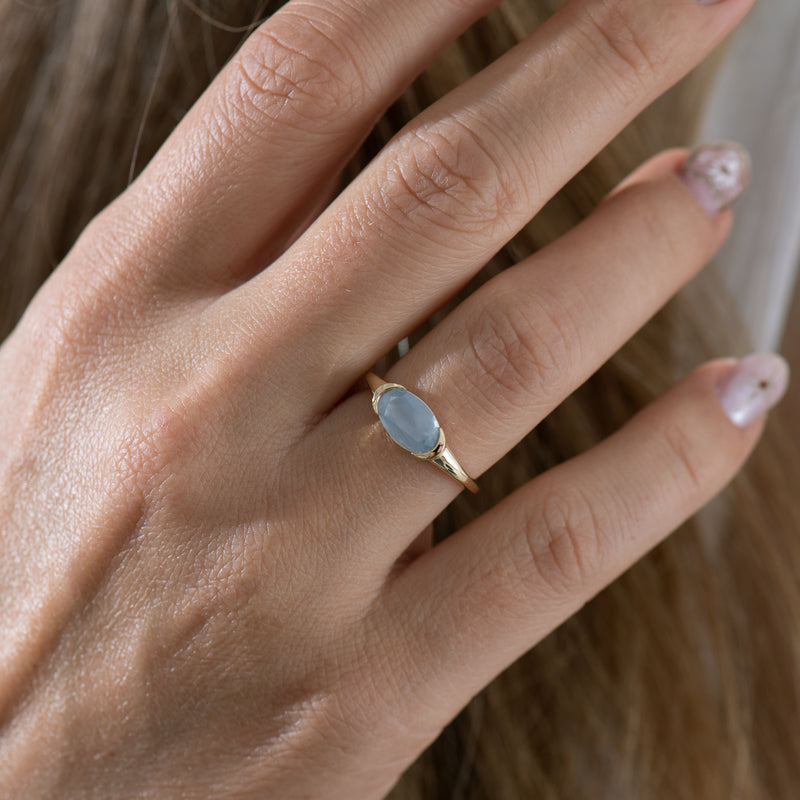 Blue-Mist-East---West-Oval-Milky-Sapphire-Ring-Midshot-Angle