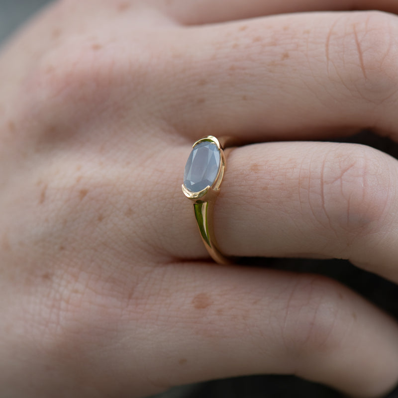 Blue-Mist-East---West-Oval-Milky-Sapphire-Ring-Side-Angle