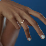 Chevron-Wedding-Ring-with-Baguette-and-Carre-Diamonds-ON-FINGER