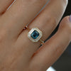 Dawn-Parti-Sapphire-_-Diamond-Halo-Engagement-Ring-Midshot_a3efa33f-d4f6-45fd-b932-e037de856206