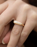 Elongated-Shield-Cut-Diamond-Solitaire-Ring-with-PaveDetailing-Angle