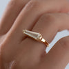 Elongated-Shield-Cut-Diamond-Solitaire-Ring-with-PaveDetailing-On-Hand-Angle