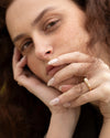 Elongated-Shield-Cut-Diamond-Solitaire-Ring-with-PaveDetailing-On-Model