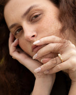 Elongated-Shield-Cut-Diamond-Solitaire-Ring-with-PaveDetailing-On-Model