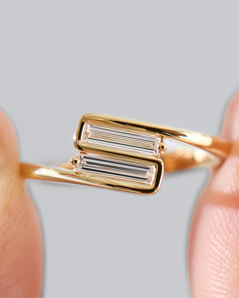 Embrace-Toi-et-Moi-Ring-with-Baguette-Diamonds-Holding-2