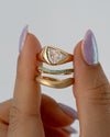 Floe-Modern-Engagement-Ring-Set-with-Paraiba-_-Gold-Bands-Holding