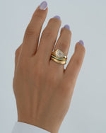 Floe-Modern-Engagement-Ring-Set-with-Paraiba-_-Gold-Bands-On-Hand