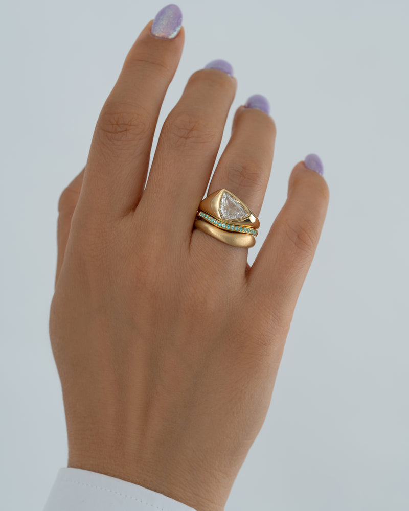 Floe-Modern-Engagement-Ring-Set-with-Paraiba-_-Gold-Bands-On-Hand