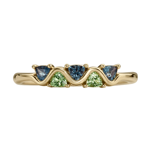 Gold ring with five triangle-shaped gemstones on a white background