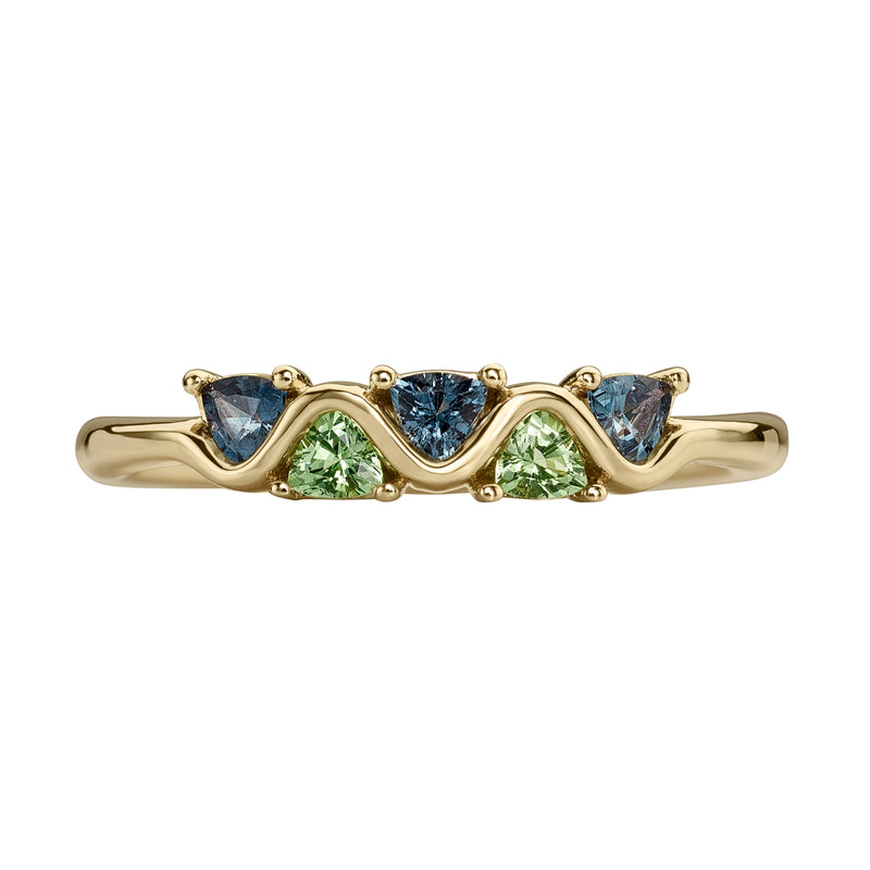 Gold ring with five triangle-shaped gemstones on a white background