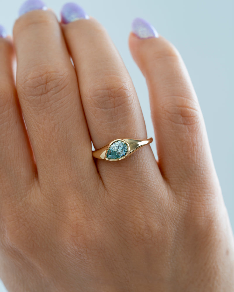 Glacier-Light-Blue-Moissanite-Solitaire-Ring-Angle_c4dca4b4-f227-4ea9-a3c6-89c7518036c6