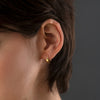 Gold-Edgy-Huggie-Earrings-Ear-Side