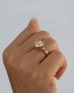 Hathi-Old-European-Cut-Diamond-_-Padparadscha-Engagement-Ring-On-Hand-Angle_93fd7711-6e9e-48b4-ae16-300f0d8b06b1