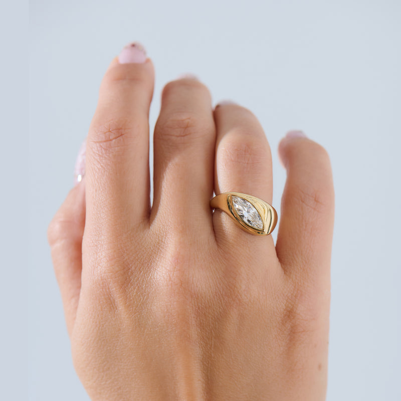 Longitude-18K-Gold-Marquise-Solitaire-Engagement-Ring-On-Hand