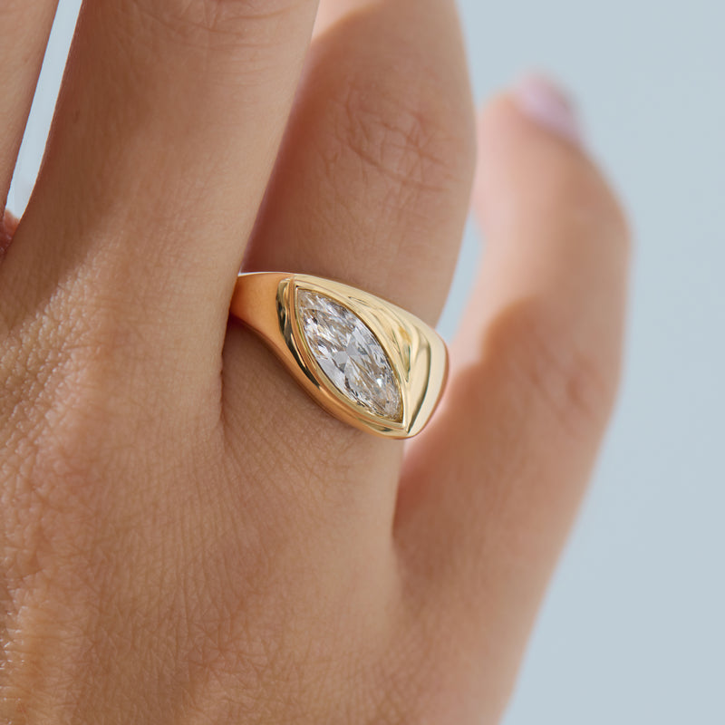 Longitude-18K-Gold-Marquise-Solitaire-Engagement-Ring-Slight-Angle