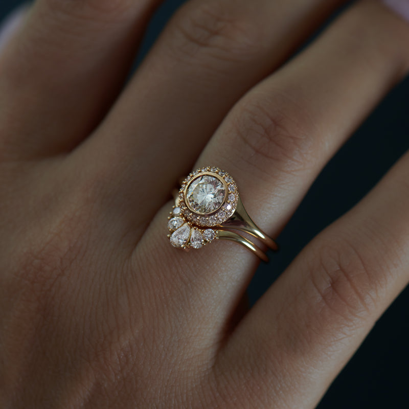 Pear-Brilliant-Diamond-Crown-Nesting-Wedding-Ring-side-shot-in-set