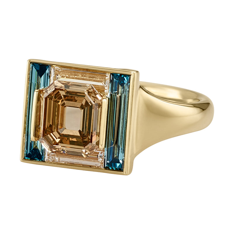 Piet-Fancy-Emerald-Cut-Diamond-Ring-with-Teal-_-White-Diamond-Halo-Packshot-Side_6be296ad-1c32-4b97-b96c-4b3ca10b9b6d