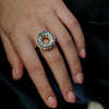 Saturn-Moons-Ring-With-Blue-Sapphire-_-White-Diamond-Baguettes-Far-Hand