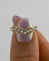 Seed-Pearl-Chevron-Gold-Band-Holding