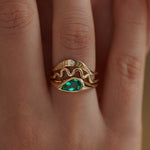 Solitaire-Engagement-Ring-with-a-Pear-Cut-Emerald-in-set-top-shot