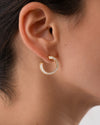 Spiral-Hoop-Earrings-with-Tapered-Baguette-Diamonds-Front-Side_647c66c8-45f5-4b38-8586-650914c542a8