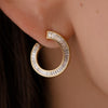 Spiral-Hoop-Earrings-with-Tapered-Baguette-Diamonds-Packshot_a2021c93-75f9-4205-a88e-e01395a8ba33