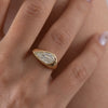 Step-Cut-Pear-Shape-Diamond-Solitaire-Ring-On-Hand