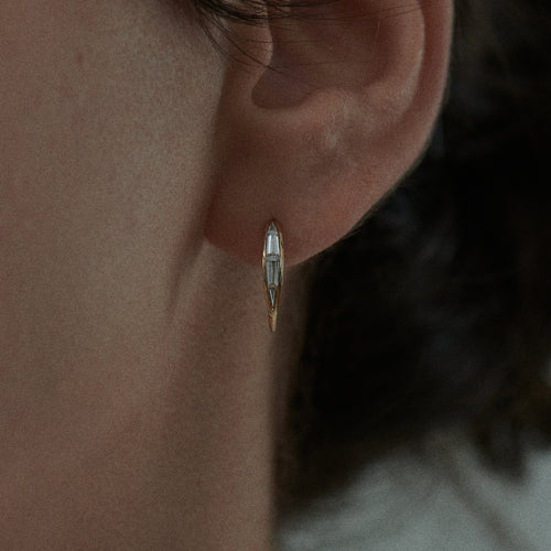 Tapered-Baguette-Diamond-Curved-Stud-Earrings-Closeup