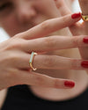    Teal-Moissanite-Baguette-Solitaire-Minimalist-Engagement-Ring-on-finger