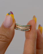 Teal-Sapphire-Modern-Stacking-Ring-Trio-Holding