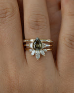 Vetiver-Fancy-Color-Pear-Diamond-Engagement-Ring-Set-On-Hand_c9c5d06b-0bfa-442a-b0dd-3e8e6fbbc310
