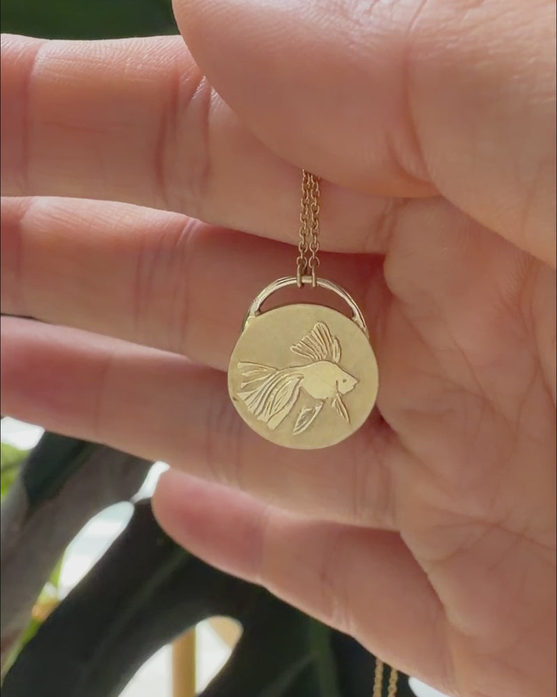 Goldfish-Coin-Pendant-Necklace-in-14K-Gold-on-video