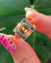 Piet-Fancy-Emerald-Cut-Diamond-Ring-with-Teal-&-White-Diamond-Halo-VIDEO-3_8de73941-2f59-4e47-84c7-1ee1473f94f9