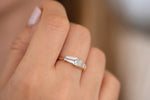 Aquamarine Engagement Ring with Gradient Diamonds on hand up close alternate view 
