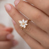 Asymmetric-Blossom-Engagement-Ring-with-Pear-Cut-Diamonds-sparking