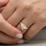 Asymmetrical-Baguette-Cluster-Ring-with-Round-Diamond-Beams-moment