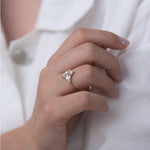 Star Diamond Engagement Ring with White Pearl closed hand